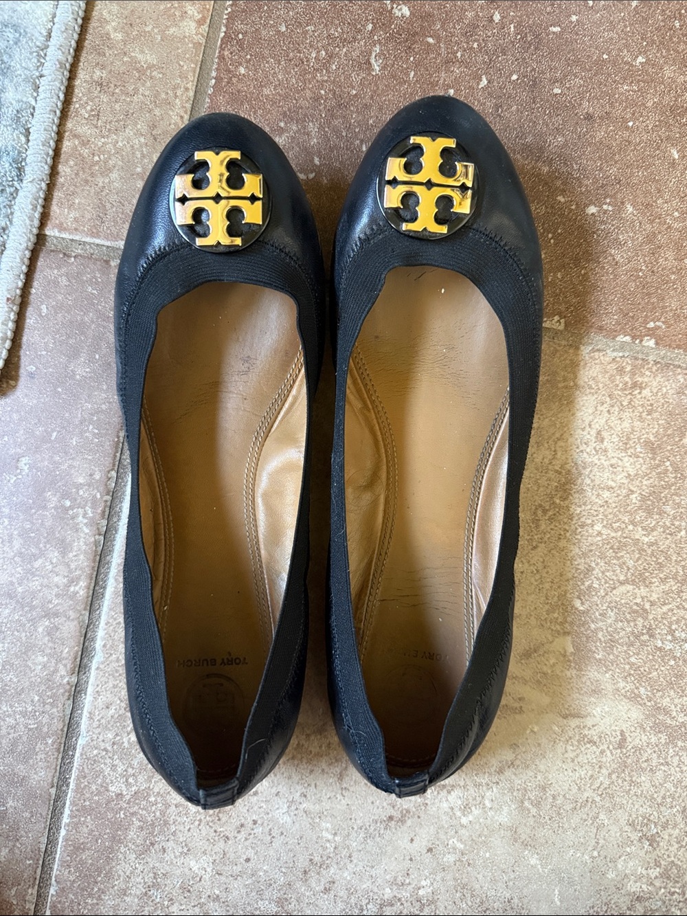 Tory Burch Black Flats with Gold Logo Medallion